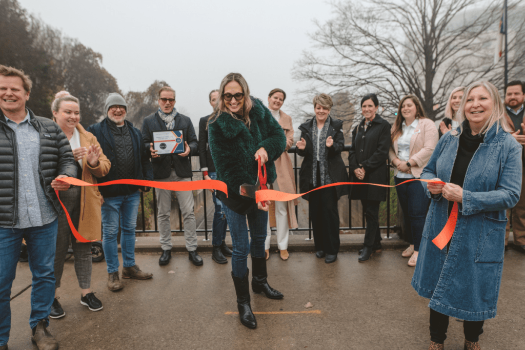 A community celebrates an overdue ribbon cutting