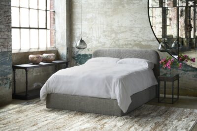 gray upholstered bed by Cisco Home